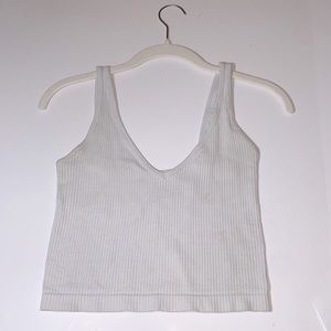 Light grey thick strapped tank top.